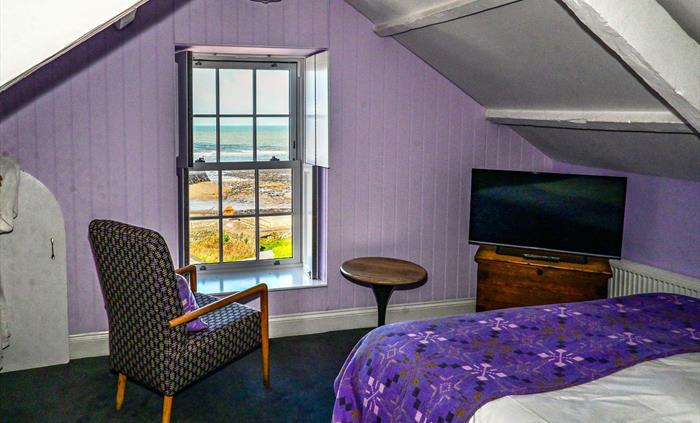 Madona Suite top floor room with views of the sea